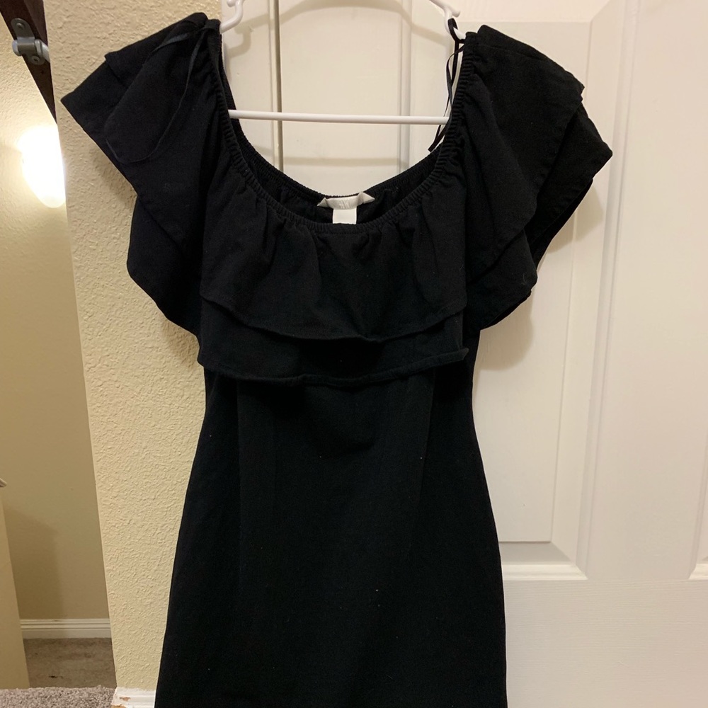 black ruffled shoulder dress